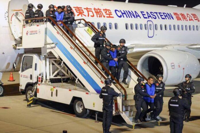 CHINA-YUNNAN-KUNMING-CRIMINAL SUSPECTS-MYANMAR-HANDOVER (CN)